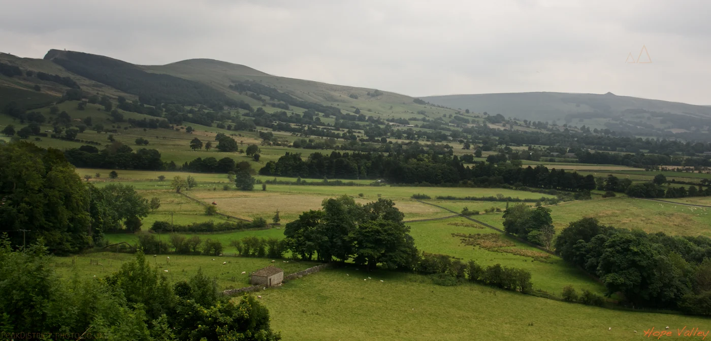 Green fields and hills across Hope Valley in the Peak District